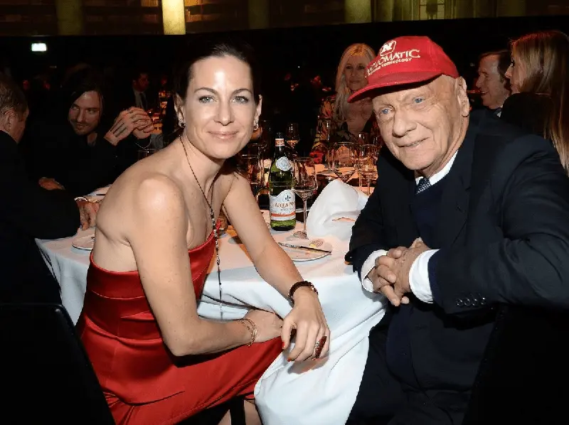 Niki Lauda and his wife Birgit Wetzinger are pictured together; Birgit saved Niki's life by donating him a kidney back when they're dating