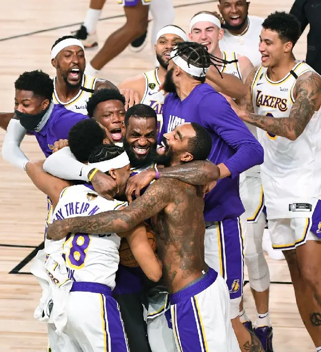 The Lakers celebrating after clinching the 2020 Championship. (Photo by Wally Skalij)