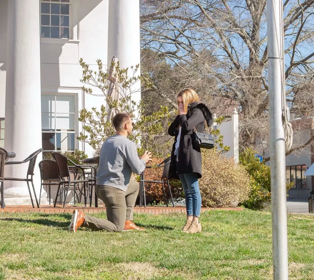 Atlanta Braves pitcher Spencer proposing his significant other, Maggie at Clemson University in February 2022.
