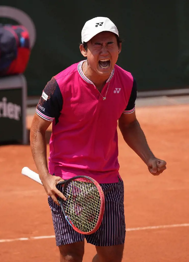 Japanese Yoshihito Nishioka reached the second round of Roland-Garros by eventually overcoming American J.J. Wolf in Paris 