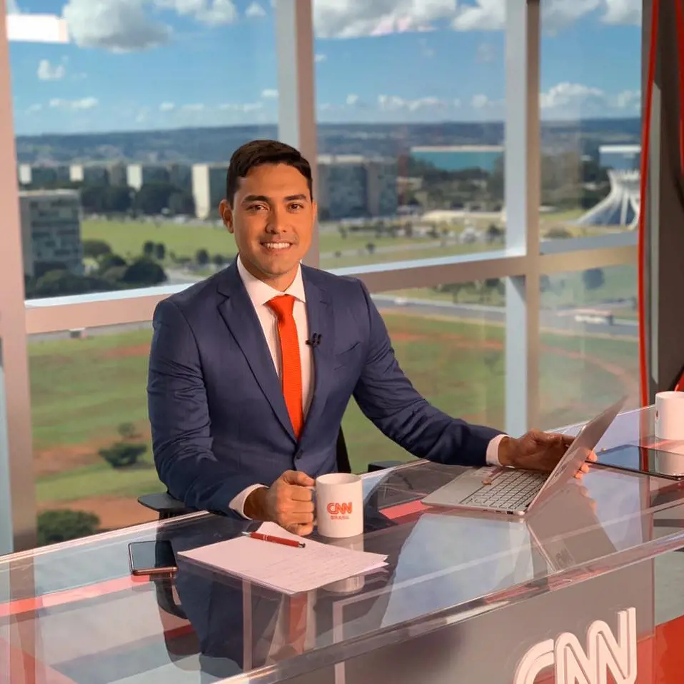 Kenzo at work, delivering news for CNN in March 2020