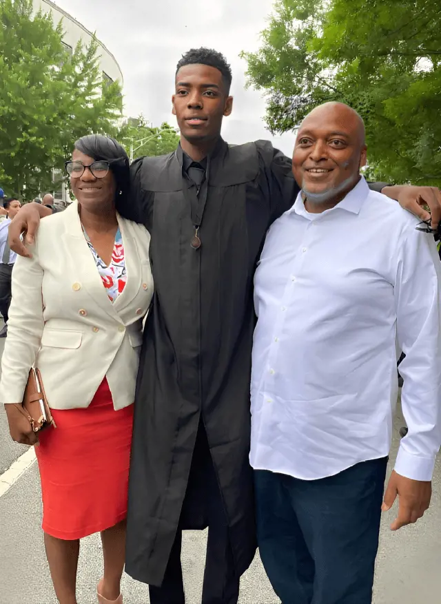 Brandon with his old folks during high school graduation in 2022.