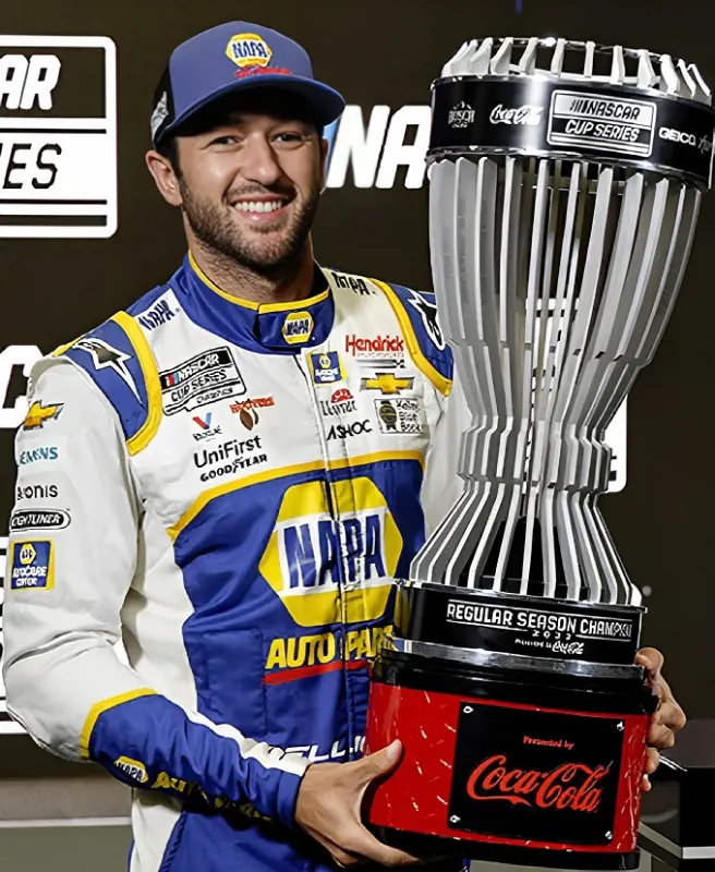 Chase Elliott holds his NASCAR regular season Champion trophy after the 2022 triumph.