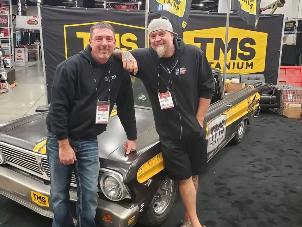 Dave hanging around with Shawn at the TMS Titanium booth a day before the Street Outlaws big race in December 2022