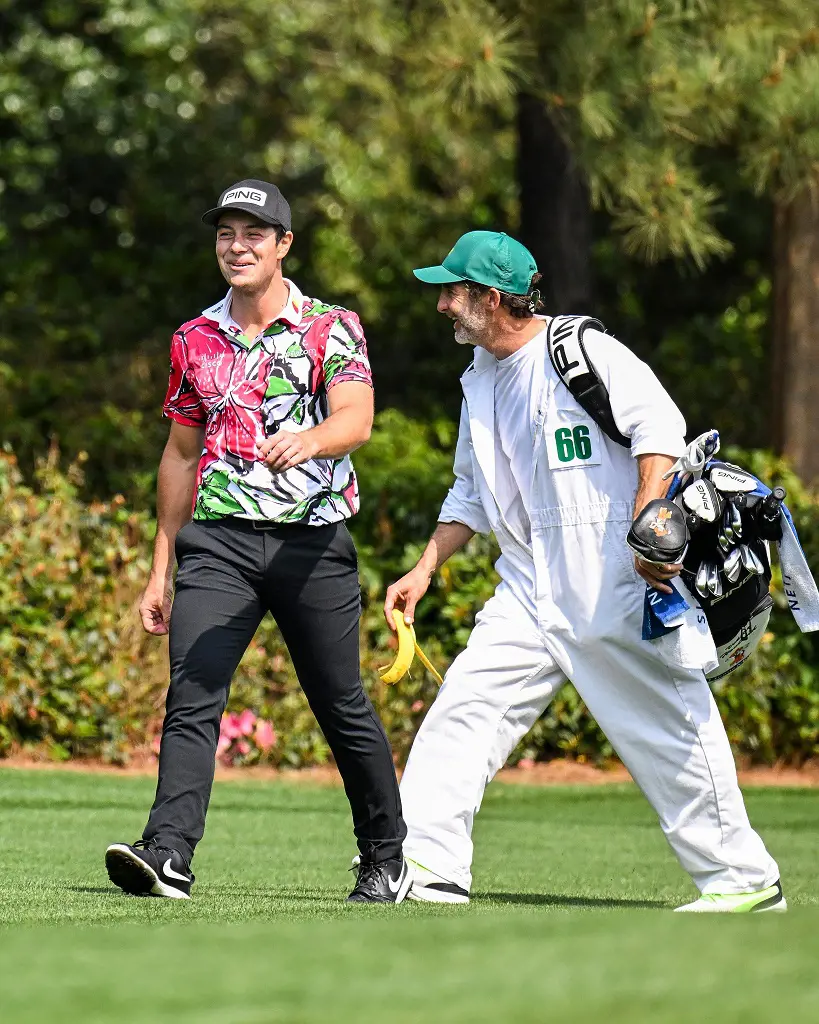 Viktor Hovland with his caddie at Augusta. Higher launch in April 2023