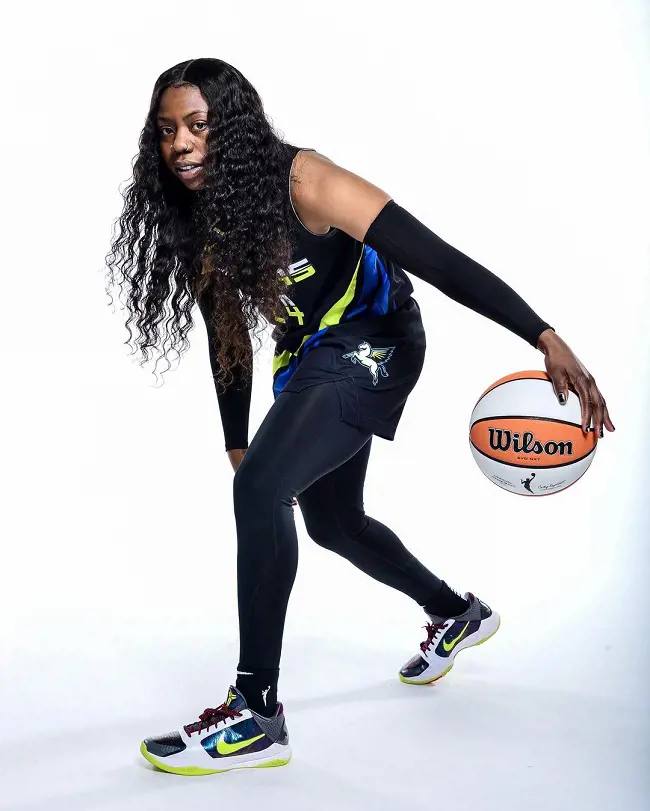 Arike pictured in her Dallas Wings gear ahead of the 2023 WNBA season.