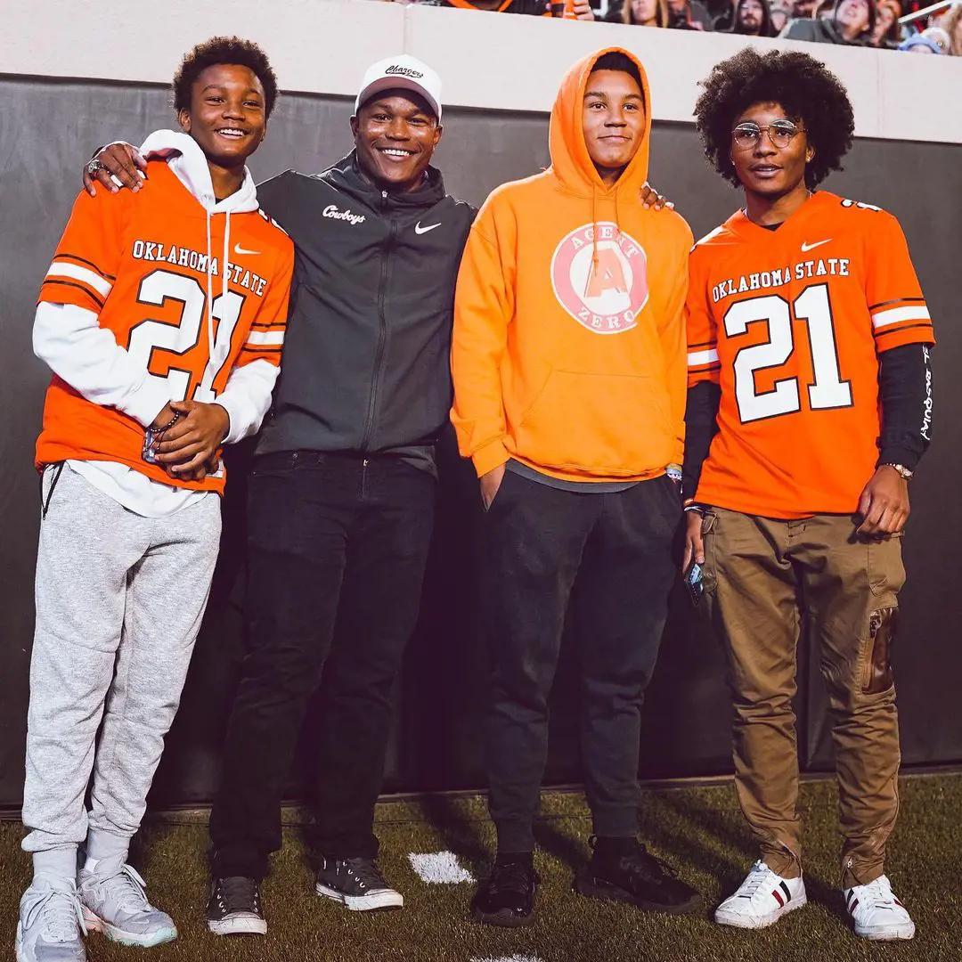 Noah(left) with Barry Nicholas and Nigel at Boone Pickens Stadium on November 14, 2021. 