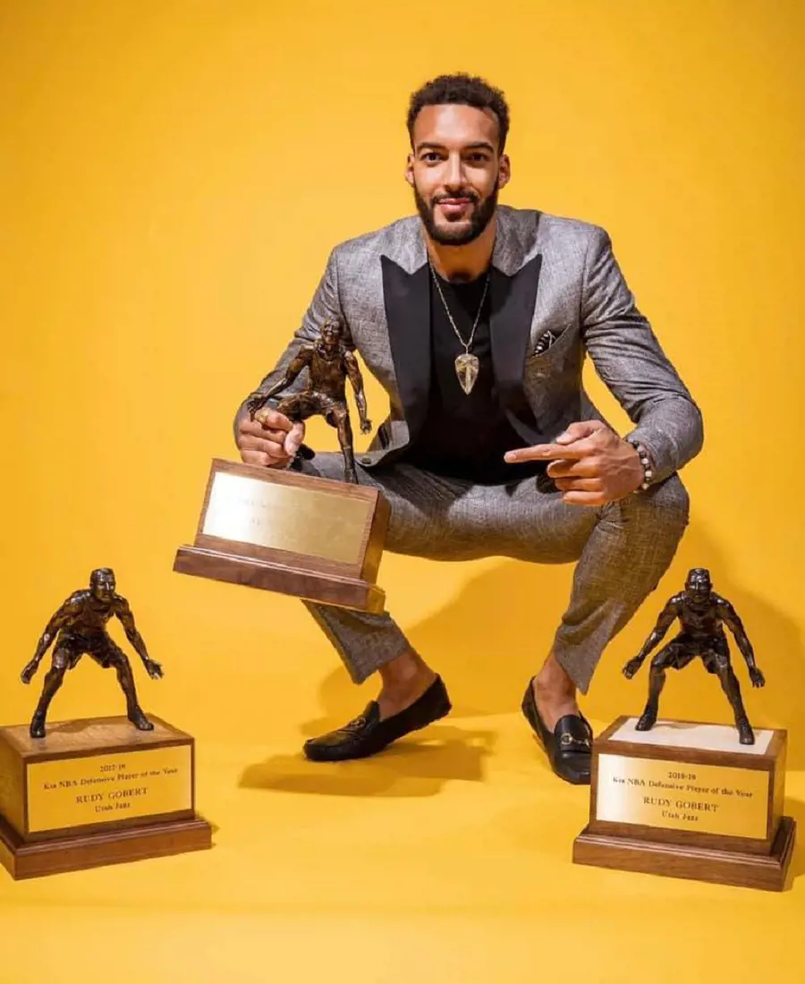 Rudy click a memorable photo with his three-defensive player award.